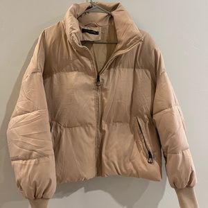 Woman’s puffer coat. VTSGN